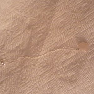 White heart pendant on silver chain